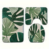 A Set Of Bathroom Short Plush Mats Featuring A Tropical Green Leaf Pattern, Including A Toilet Seat Cover, A U-Shaped Toilet Mat, Made Of Soft Flannel Material, Designed To Be Non-Slip